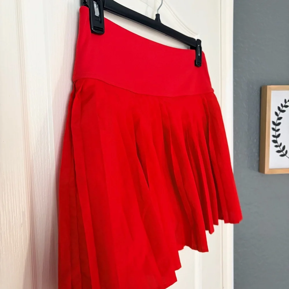 Fabletics Hot Shot Pleated Skirt Classic Mini, heated red, Large - Picture 5 of 10